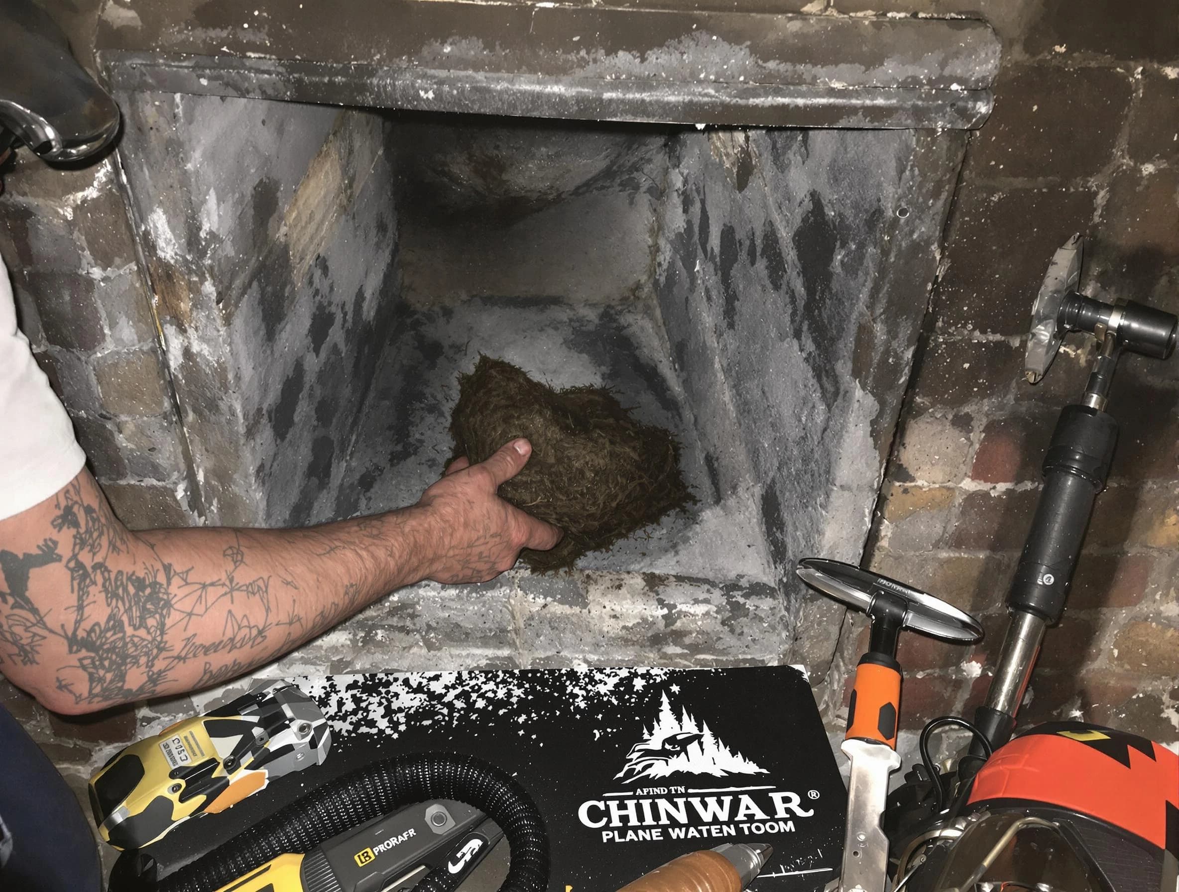 Grayson Chimney Sweep safely removing debris and screening chimney in Grayson, GA