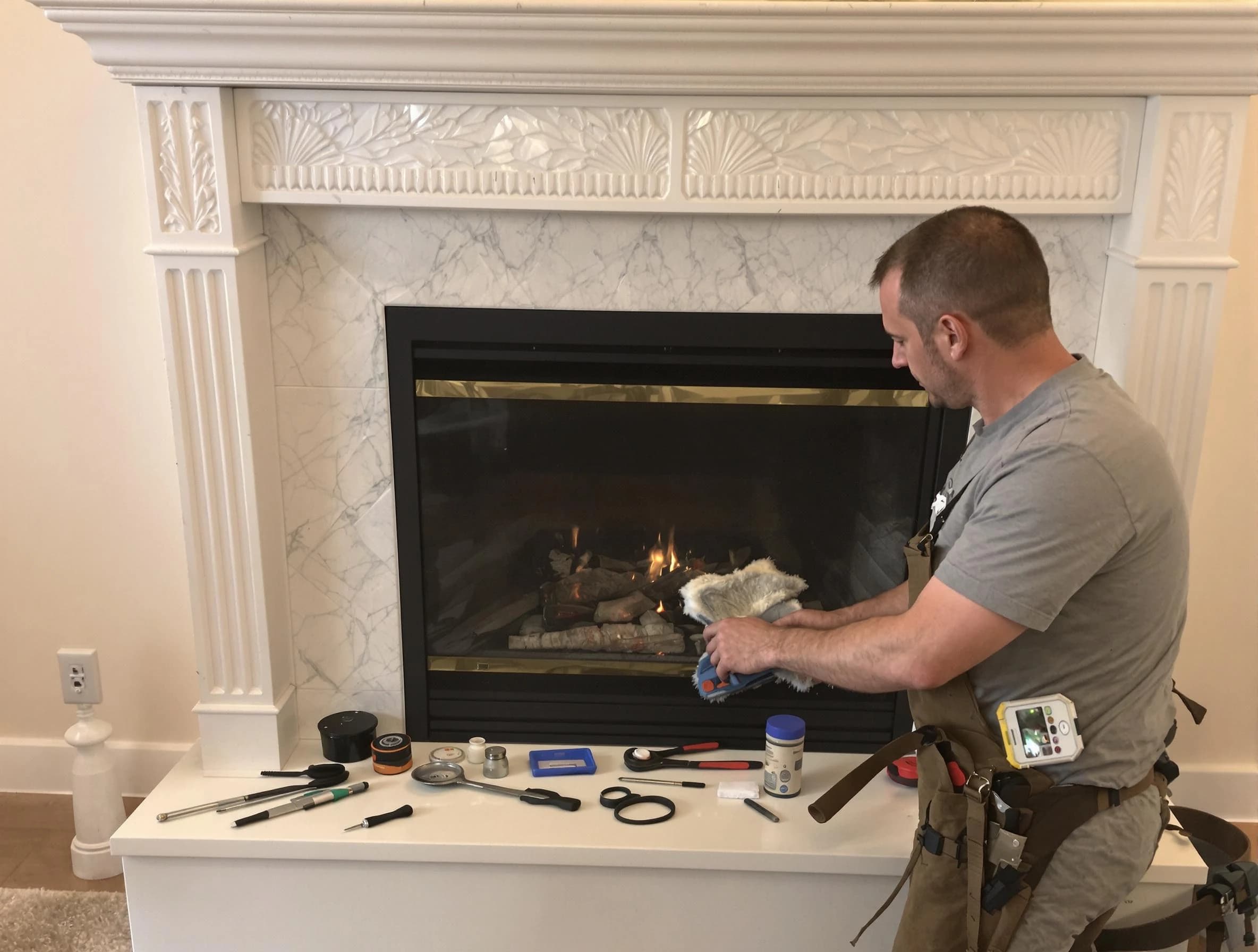 Grayson Chimney Sweep performing fireplace maintenance in Grayson, GA